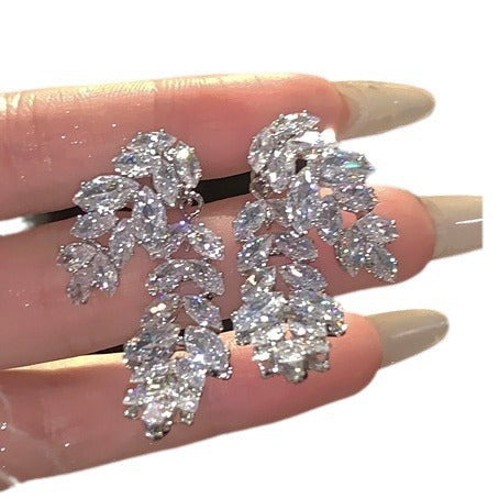 Fully Diamond-studded Leaf Earrings For A Sophisticated Lookwearable On Either Side