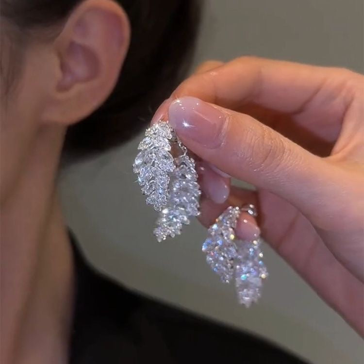 Fully Diamond-studded Leaf Earrings For A Sophisticated Lookwearable On Either Side